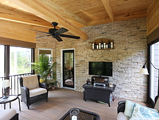 Screened & Covered Deck with a Stone Wall in St. Louis, MO