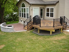 Decks St. Charles Fiberon Ipe with Black Aluminum Railing and Paver Patio St. Louis, MO