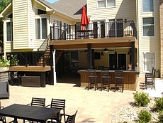 Decks St. Louis Fiberon Ipe Decking with Black Aluminum Railing with Bar and Underdeck Ceiling Chest