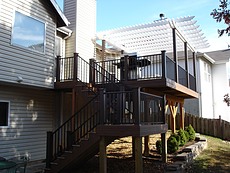 Decks St. Louis Timbertech Walnut Decking with Black Aluminum Railing and Pergola Ballwin, MO