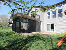 Curved Deck with Retractable Screens in St. Louis