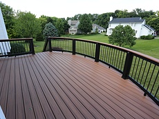 Curved Composite Deck St. Charles - Trex Decking with Black Builder Railing